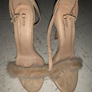 Olivia James heels